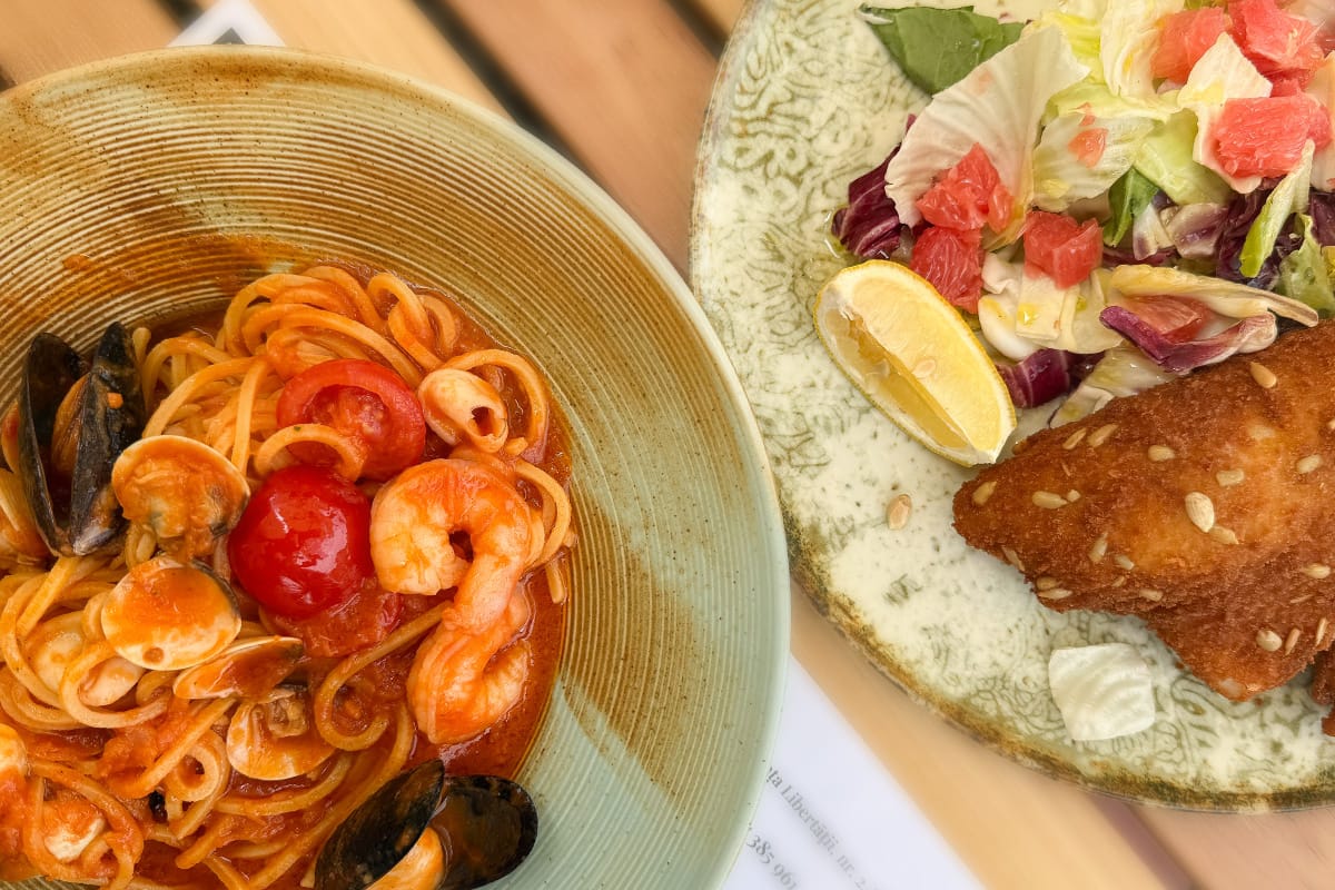 Spaghetti mit Meeresfrüchten und Doradenfilet im Restaurant The Fisher in Timișoara